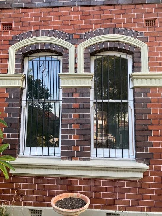 Traditional double-hung sash windows being repaired in a Sydney heritage interior